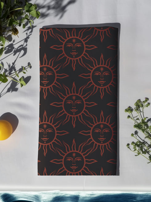 Elegant black cloth napkins with a deep red celestial sun motif, crafted from polyester in a four-piece set, designed for sophisticated dining.